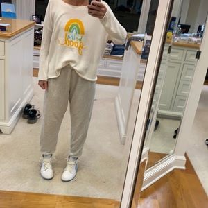 White knit sweater that says be the good
